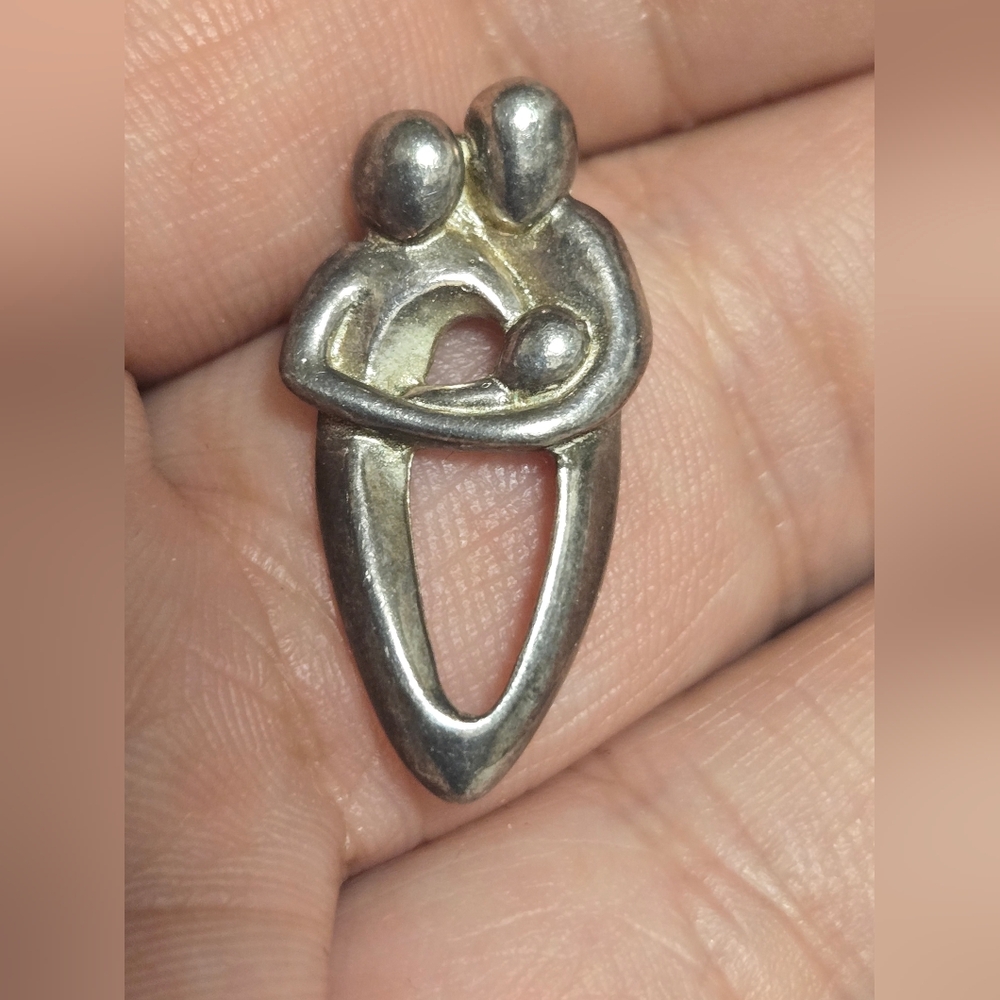 Elegant Silver Family Pendant